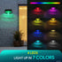Outdoor wall lights with RGB color-changing capabilities on a brick wall.