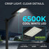 A black solar-powered outdoor street light with a cool white LED panel, shown illuminated against a dark night scene. The image includes promotional text highlighting '6500K COOL WHITE LED' and 'SMD5050 LED TECHNOLOGY', plus a close-up inset of the light head.