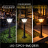 Three outdoor solar lamps with different color modes on a patio setting.